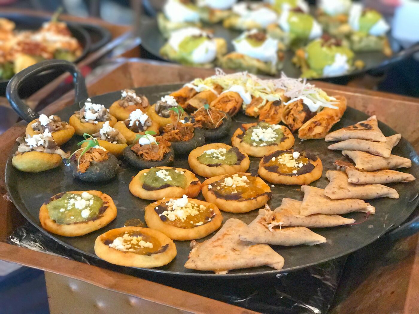 Start with masa-based hors d'oeuvres including boat-like memelas and triangular tetelas.