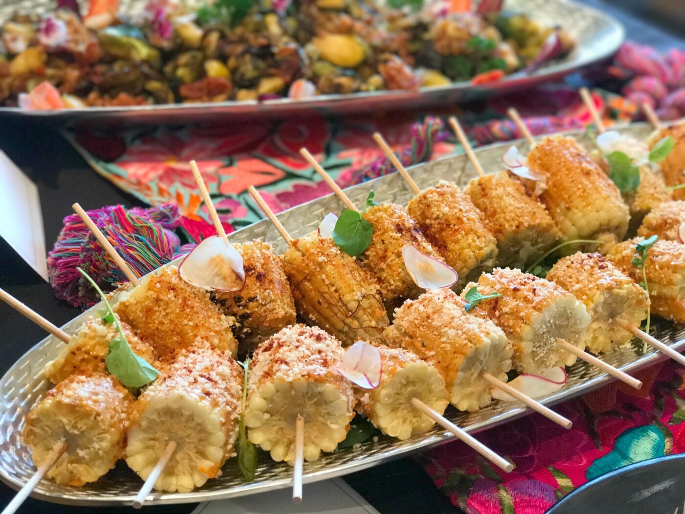 Even the elote is picture-perfect. They're served alongside veggie dishes including mushrooms and roasted Brussels sprouts.