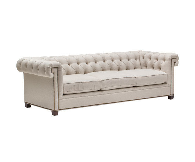 This traditional Chesterfield-style sofa, upholstered in a creamy cotton-linen blend, features a classical influence courtesy the subtle Greek key motif on its rolled arms.High Fashion Home, 3100 Travis St.713-528-3838, highfashionhome.com