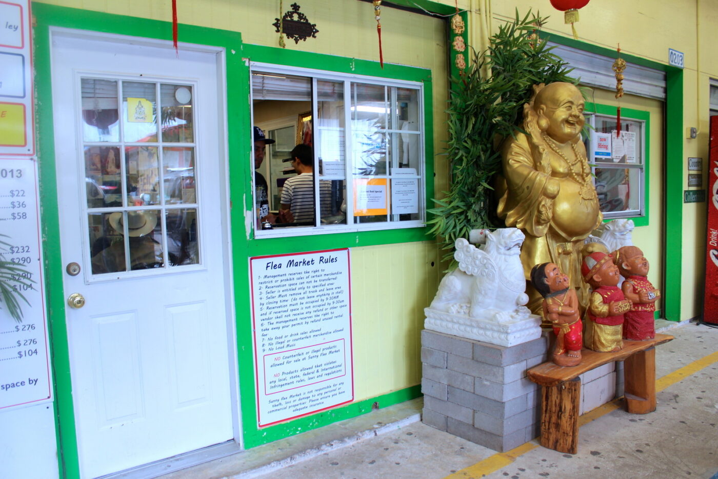 Buddhas are found throughout the flea market, a nod to its Chinese ownership.