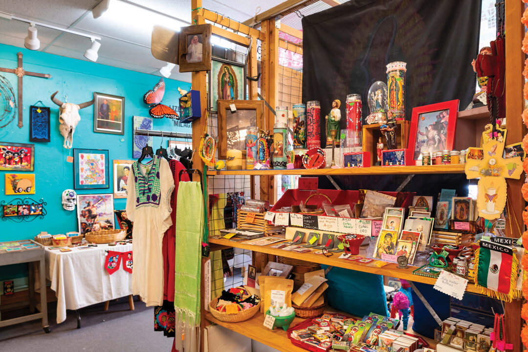 A shelf full of handmade gifts, including candles.