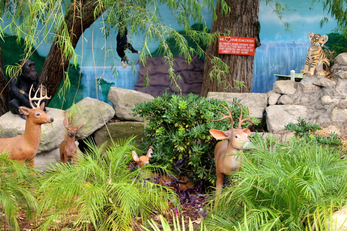 A zoo with live animals could be troublesome. Fake deer, fake monkeys, and fake cheetah cubs all get along much better and probably won't eat anyone.