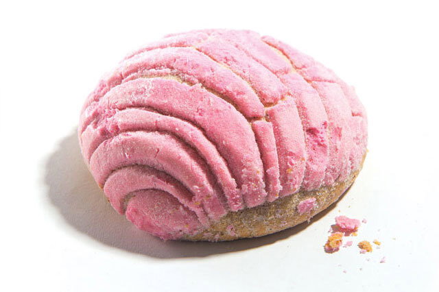 Light, airy, yeast-risen dough topped with a sugary shell pattern