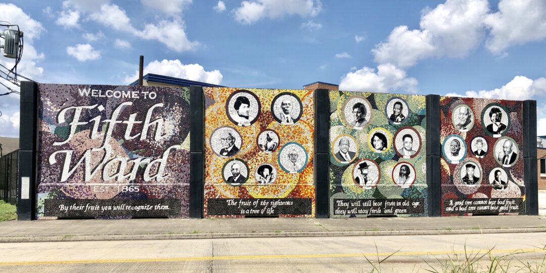 A mural of famous people from Houston's Fifth Ward