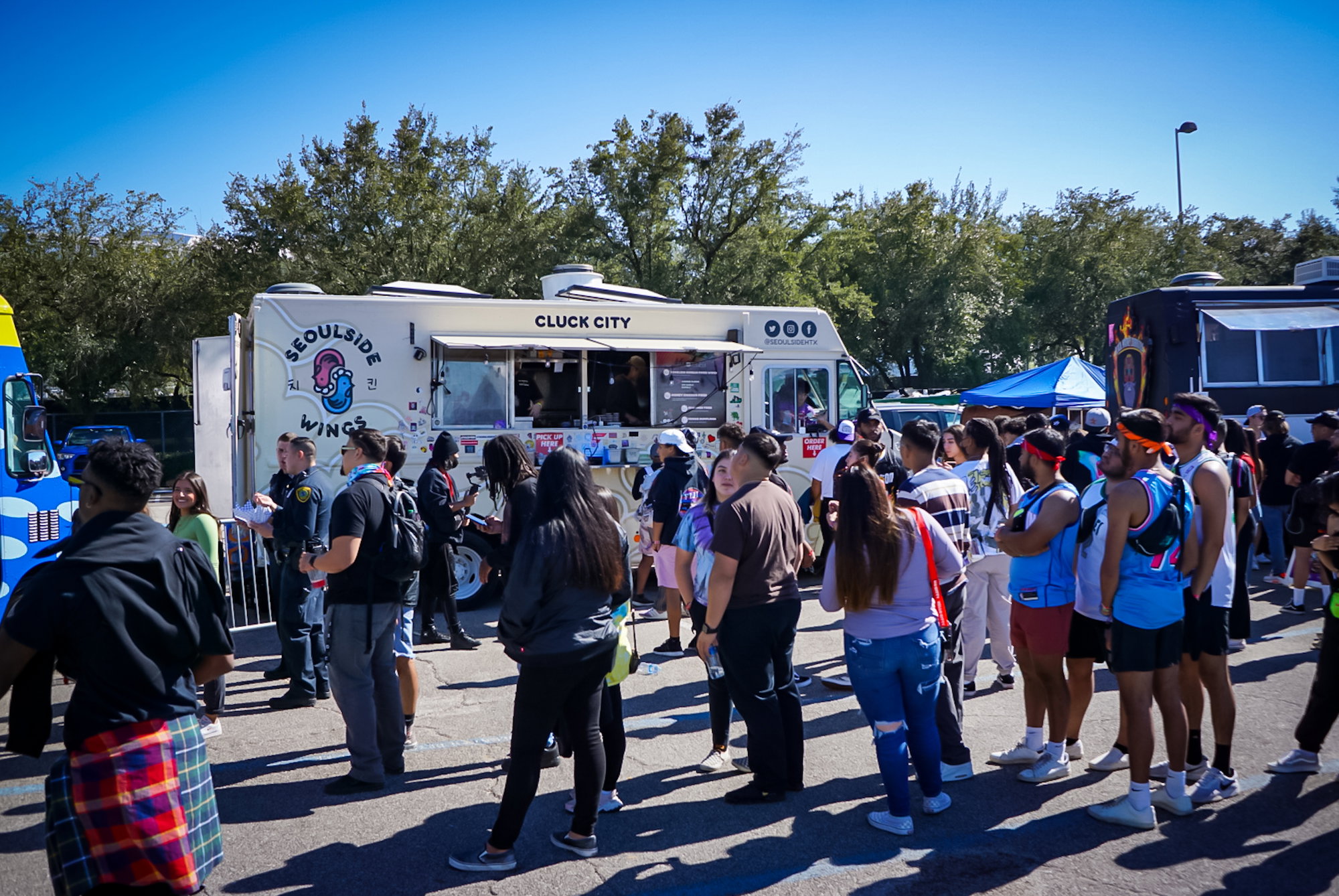 Local food truck Seoulside Wings serving hungry fans.