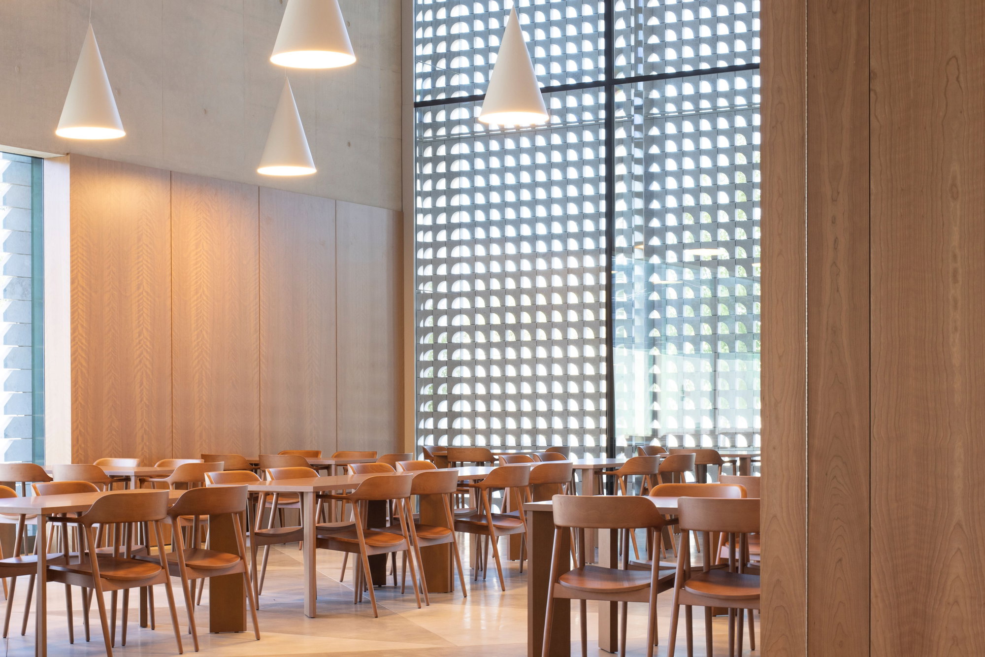 A cafe with a modern, geometric aesthetic and natural light.