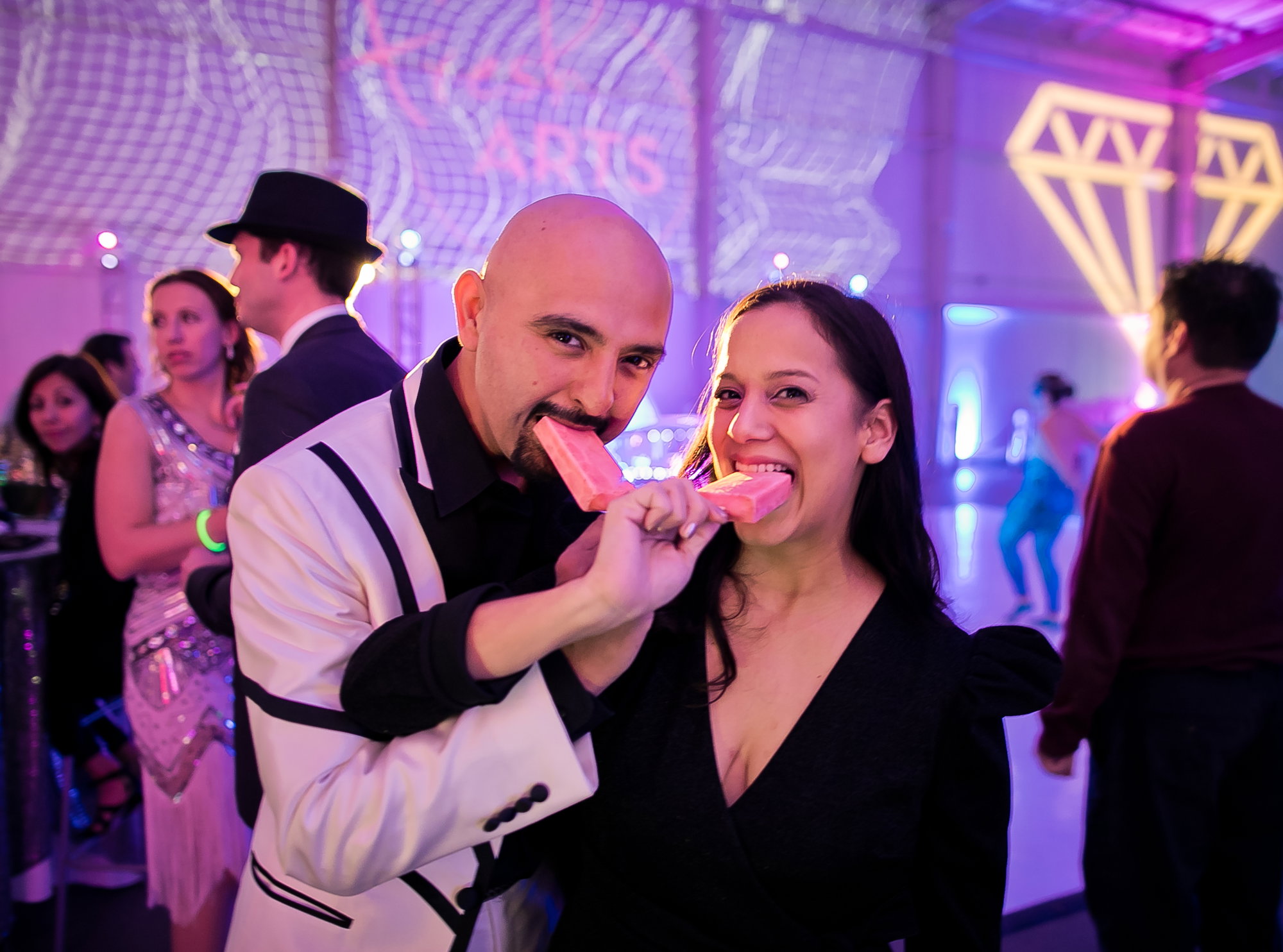 Fresh Arts board member Gonzo 247 and Carolyn Casey-Figueroa enjoy treats from Popson TX and Austin Eastciders