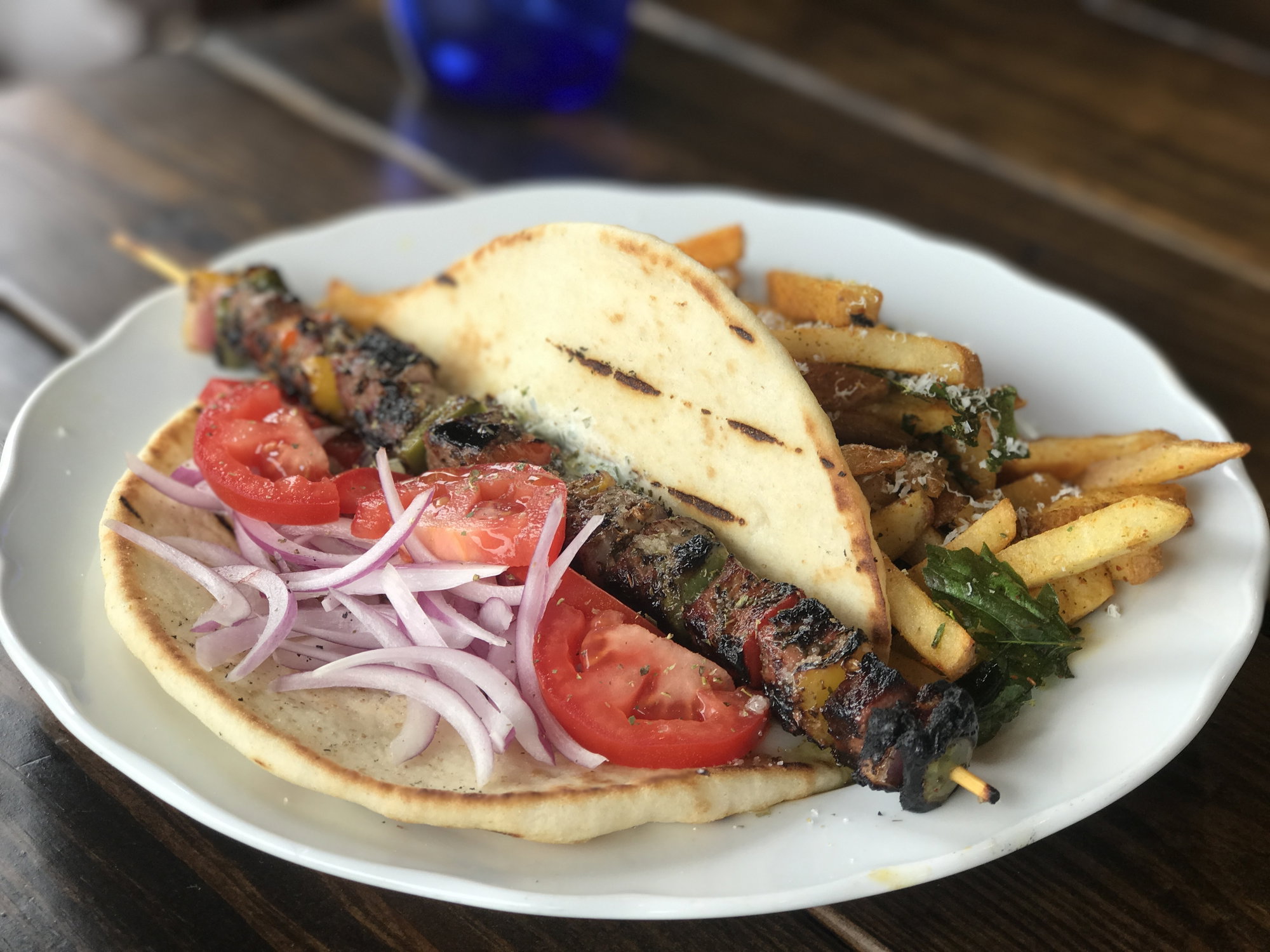 Lamb souvlaki is bookended with peppers and onions and served with thrice-fried fries worth the price of admission on their own. Souvlaki and gyro dishes, including a homemade version of Greek-American beef-and-lamb gyro, are available personal-sized or as a platter.