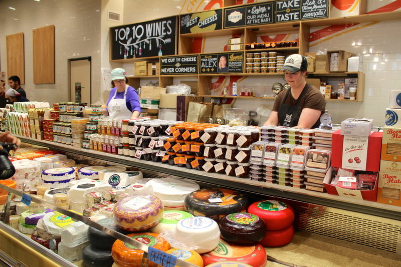 In-house cheese masters will slice off a piece of any cheese for you to try.